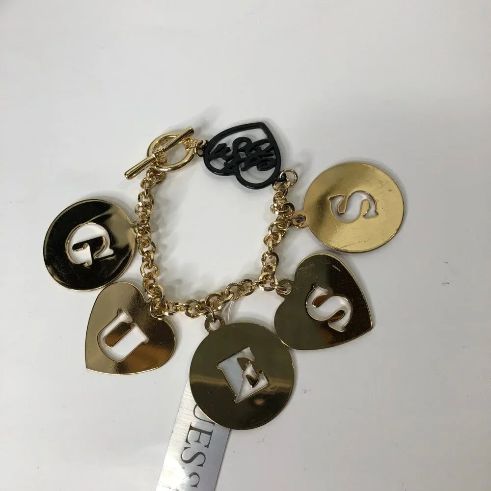 GUESS GOLD TONE LETTER CHARMS 7